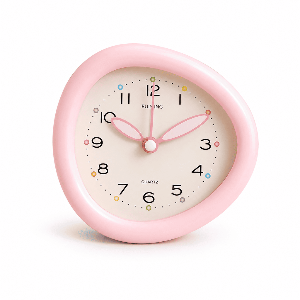 reveil analogique rose sur fond blanc - monreveil.com