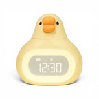 Reveil Canard Veilleuse lumineux jaune sur fond blanc
