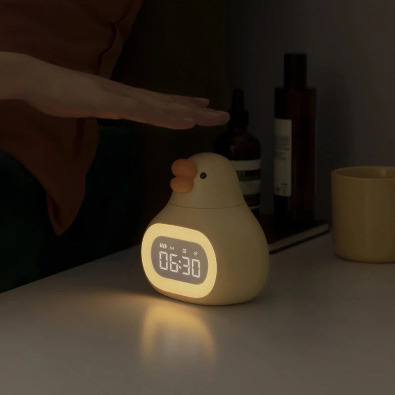 Reveil Canard lumineux jaune sur table - monreveil.com