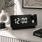 reveil projection noir grand ecran sur un bureau 